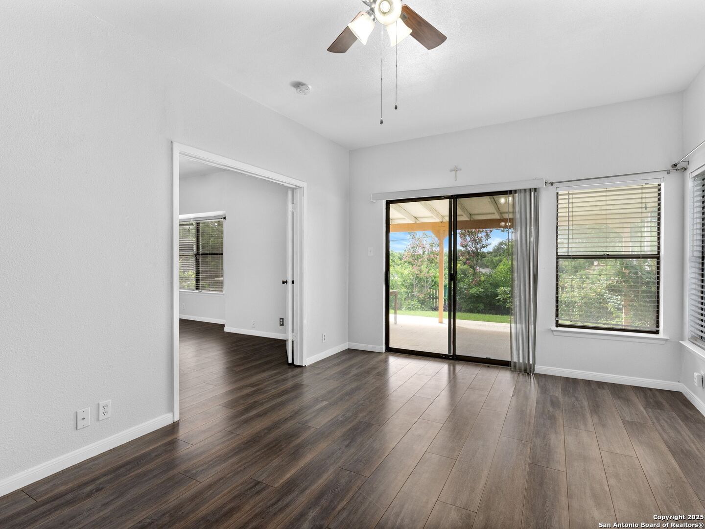5430 Vista Court San Antonio, TX 78247 - Photo 9 of 37 an empty room with wooden floor and windows