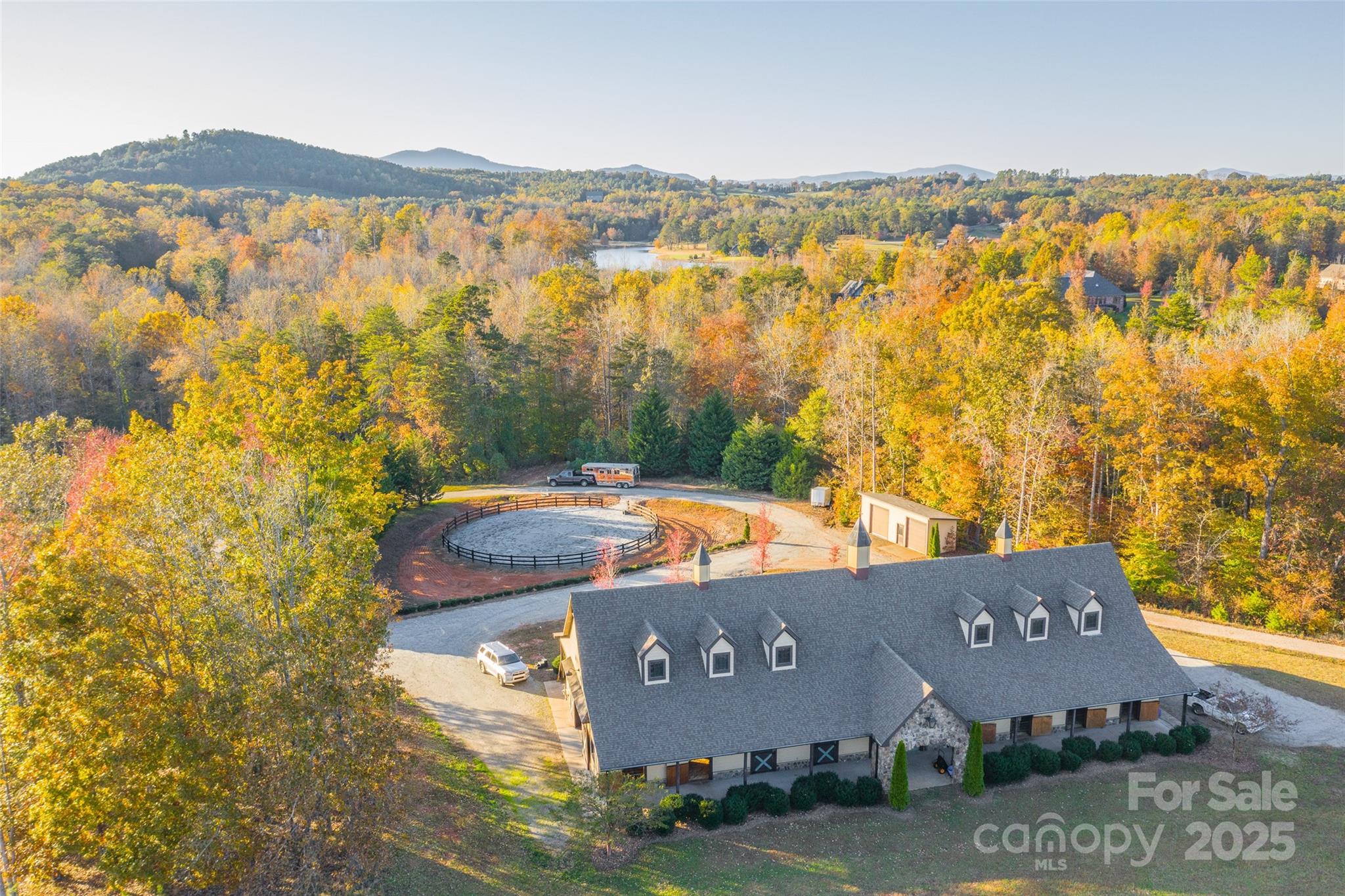 Lot 18 Mapleton Lane, Unit 18 Tryon, NC 28782 - Photo 23 of 30 a view of a lake in middle of the town