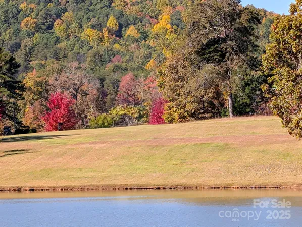 a view of an outdoor space and a lake view