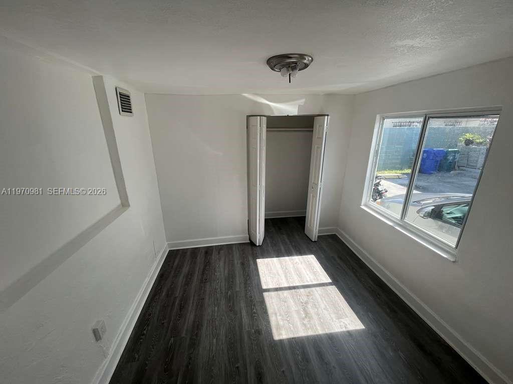 2758 Southwest 3rd Street Miami, FL 33135 - Photo 17 of 19 a view of hallway with window