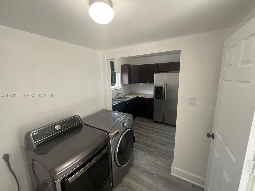 2758 Southwest 3rd Street Miami, FL 33135 - Photo 18 of 19 a utility room with dryer and washer