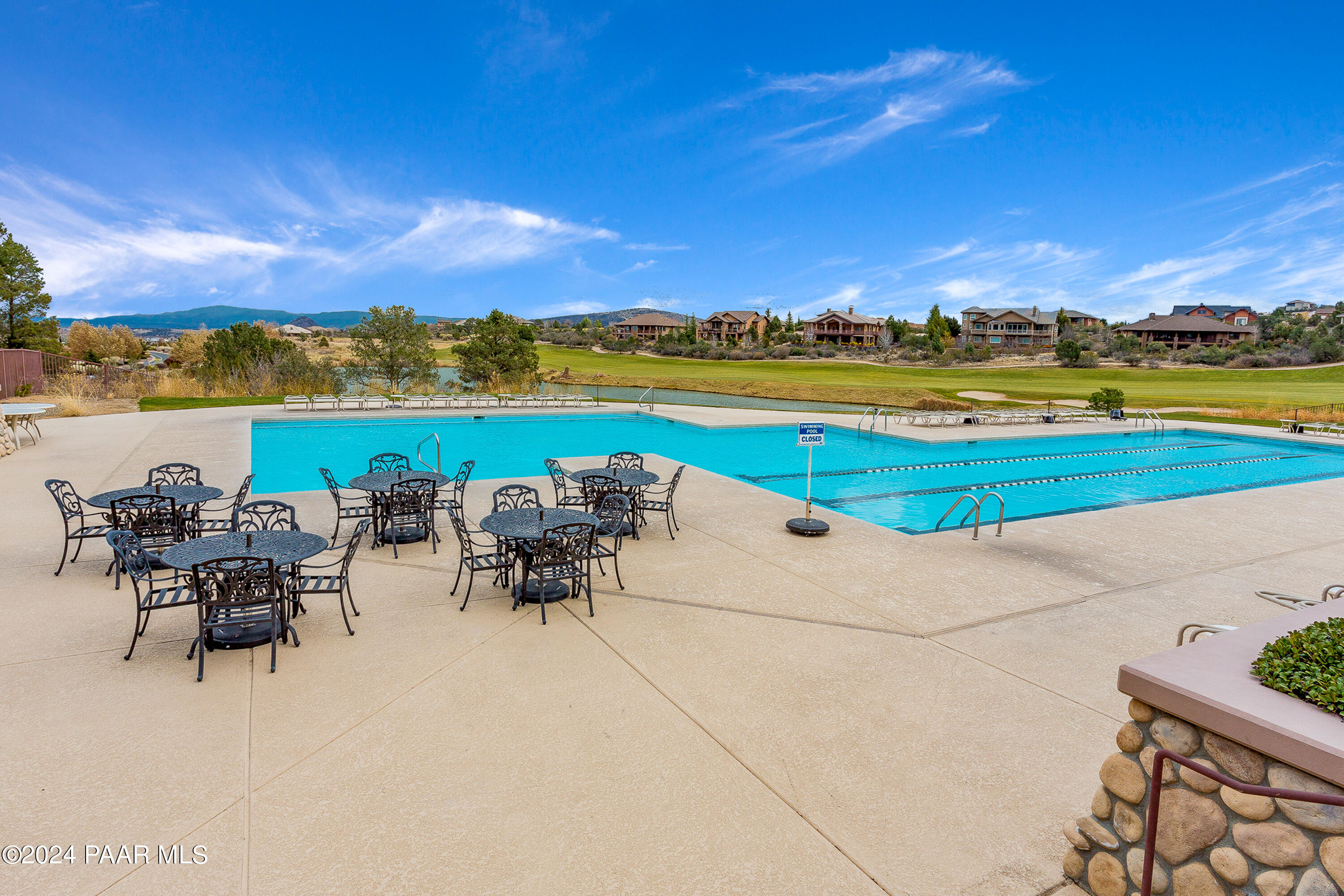 1195 Rigo Ranch Road Prescott Valley, AZ 86314 - Photo 59 of 65 a view of a terrace with furniture and city view