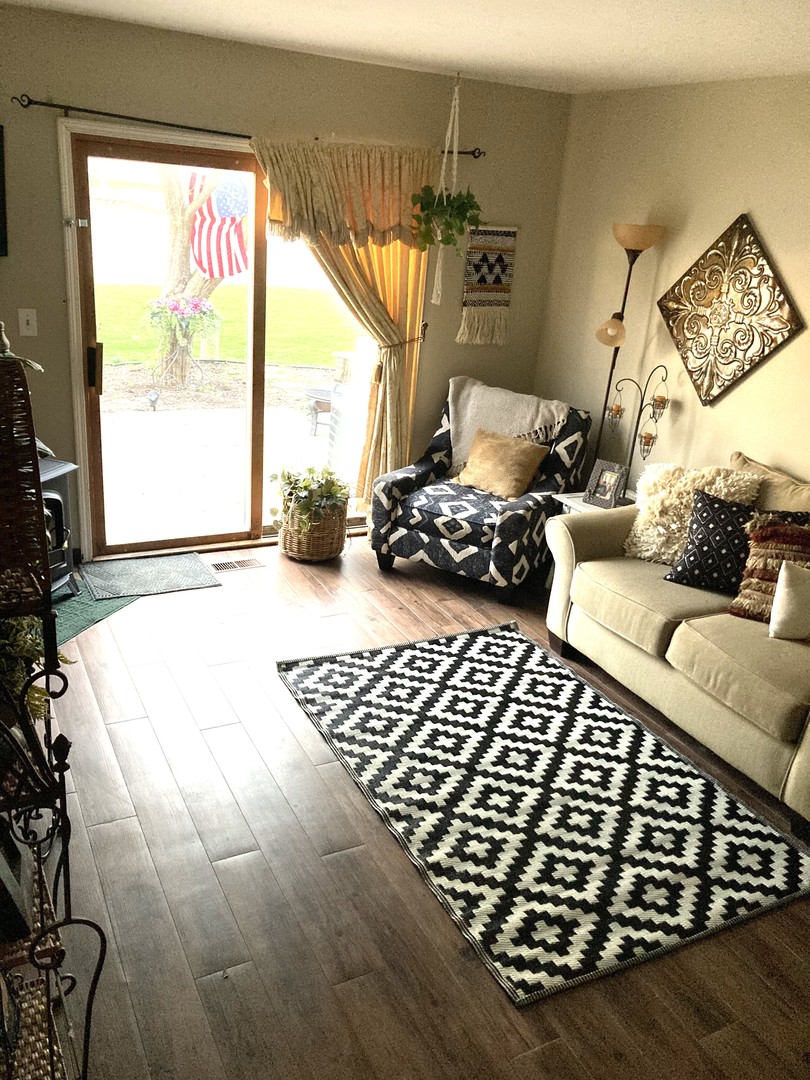 1463 Elder Drive Aurora, IL 60506 - Photo 12 of 32 a bedroom with furniture and a large window