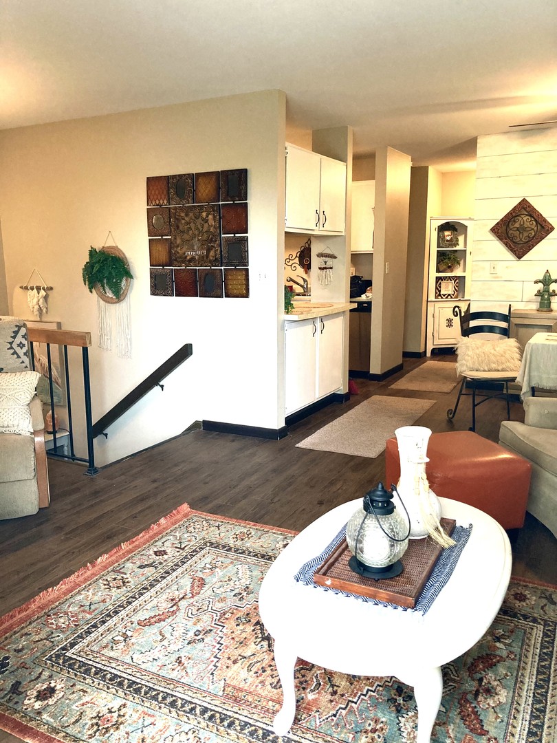 1463 Elder Drive Aurora, IL 60506 - Photo 8 of 32 a living room with furniture and a table