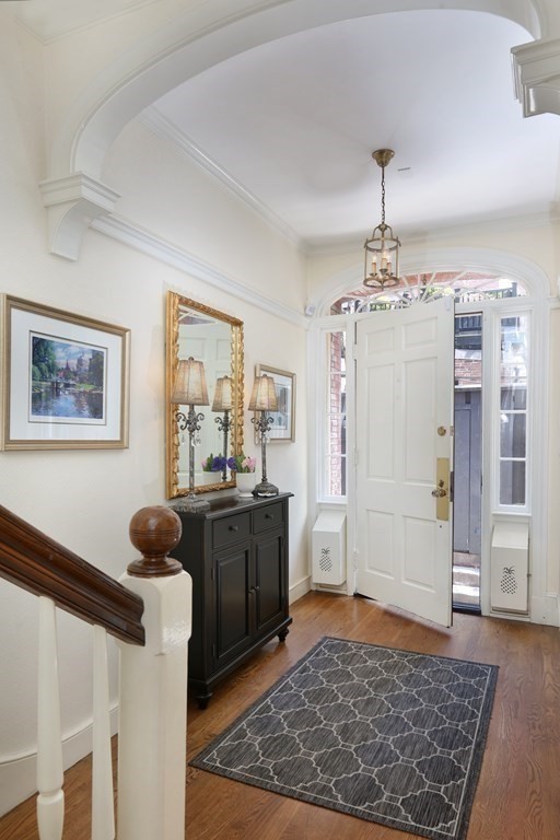 44 Cedar Ln Way Boston, MA 02114 - Photo 14 of 17 a living room with furniture rug and window
