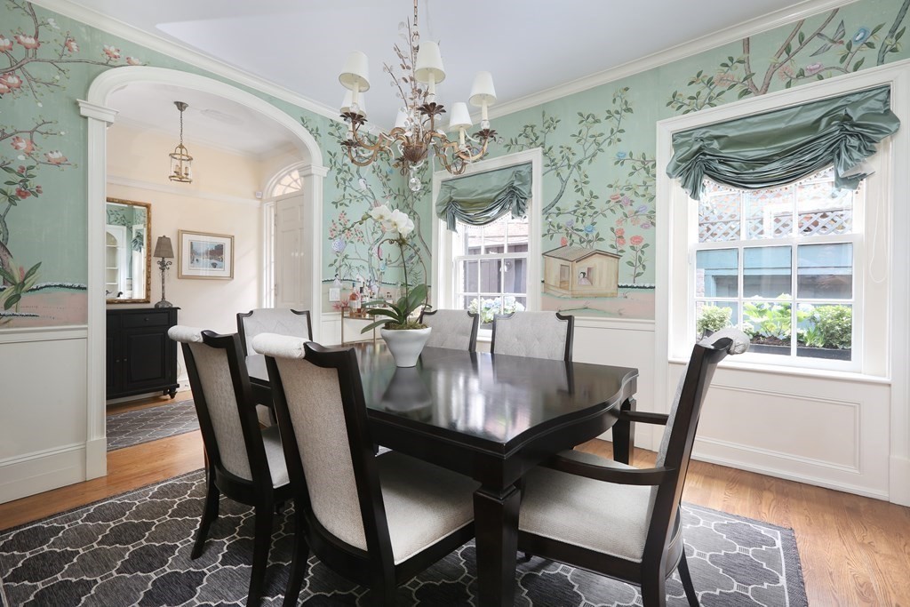 44 Cedar Ln Way Boston, MA 02114 - Photo 2 of 17 a view of a dining room with furniture window and wooden floor