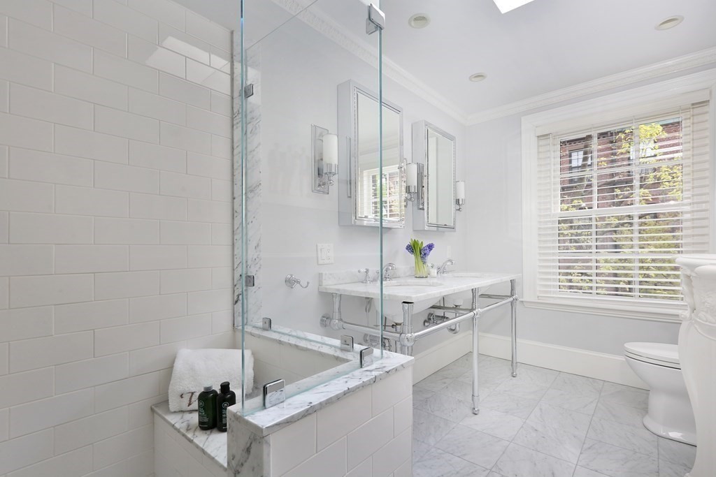44 Cedar Ln Way Boston, MA 02114 - Photo 7 of 17 a kitchen with a sink and a toilet