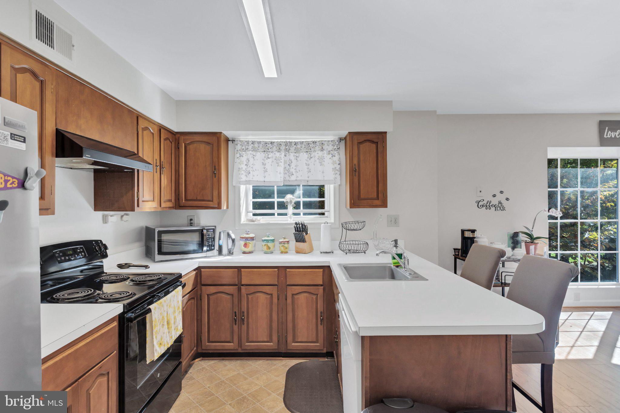 9009 Sweet Birch Court Springfield, VA 22152 - Photo 10 of 34 Bright and inviting kitchen space.