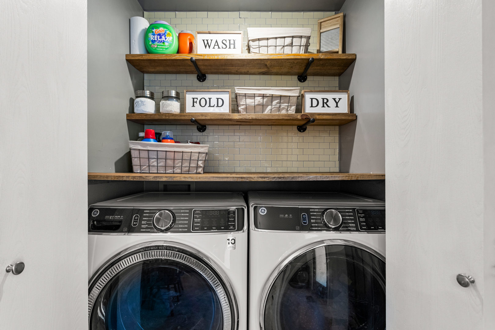 2116 Robin Road Mahomet, IL 61853 - Photo 14 of 27 a view of washer and dryer with rug