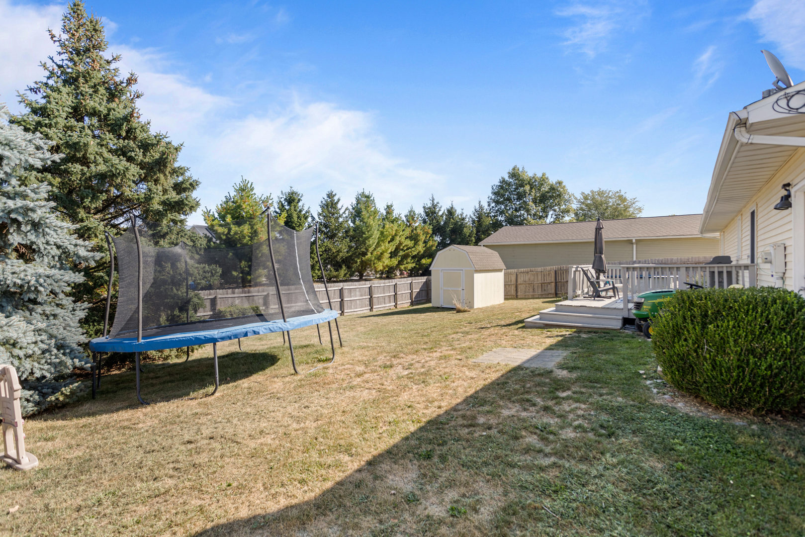 2116 Robin Road Mahomet, IL 61853 - Photo 26 of 27 a backyard of a house with table and chairs