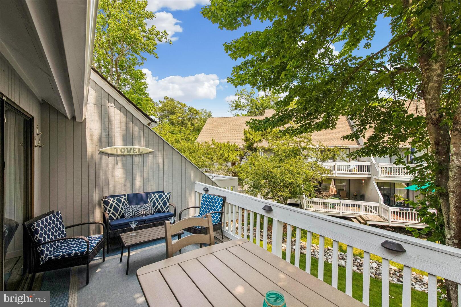 39689 Round Robin Way, Unit 3103 Bethany Beach, DE 19930 - Photo 10 of 34 a view of a two chairs on the roof deck