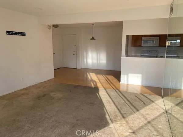 a view of hallway with granite countertop
