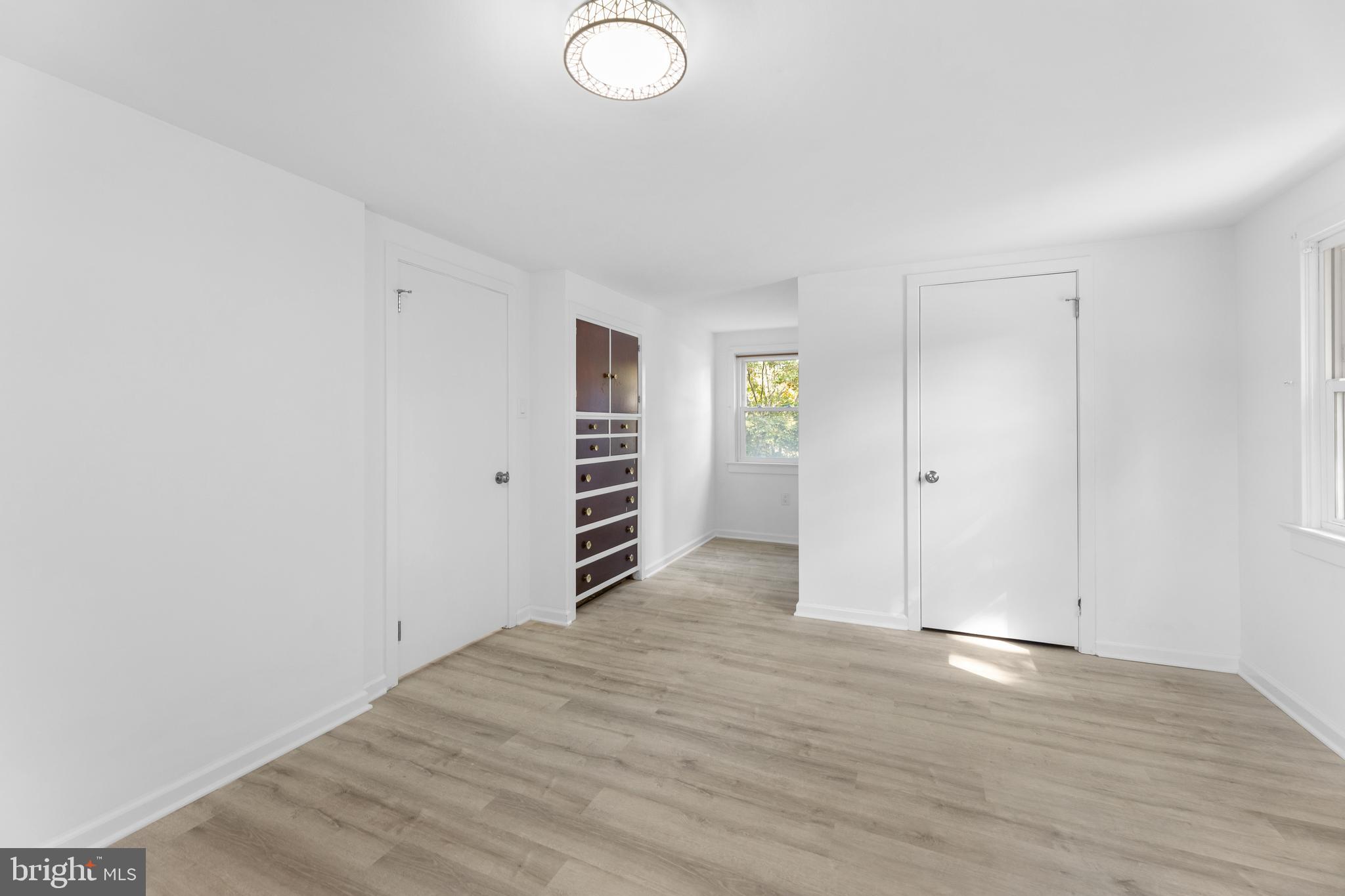245 Paxson Avenue Hamilton, NJ 08690 - Photo 14 of 26 wooden floor in an empty room