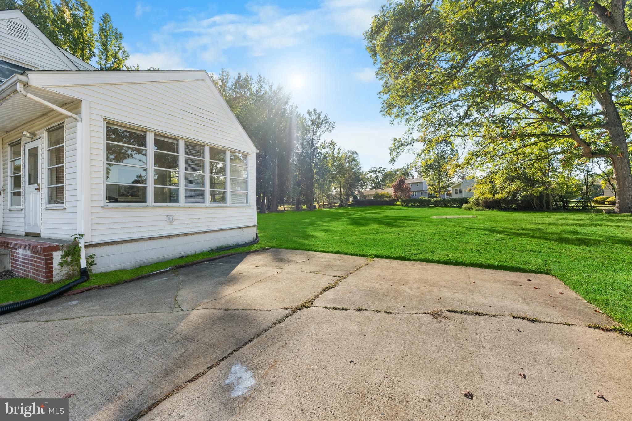 245 Paxson Avenue Hamilton, NJ 08690 - Photo 23 of 26 a house with a yard