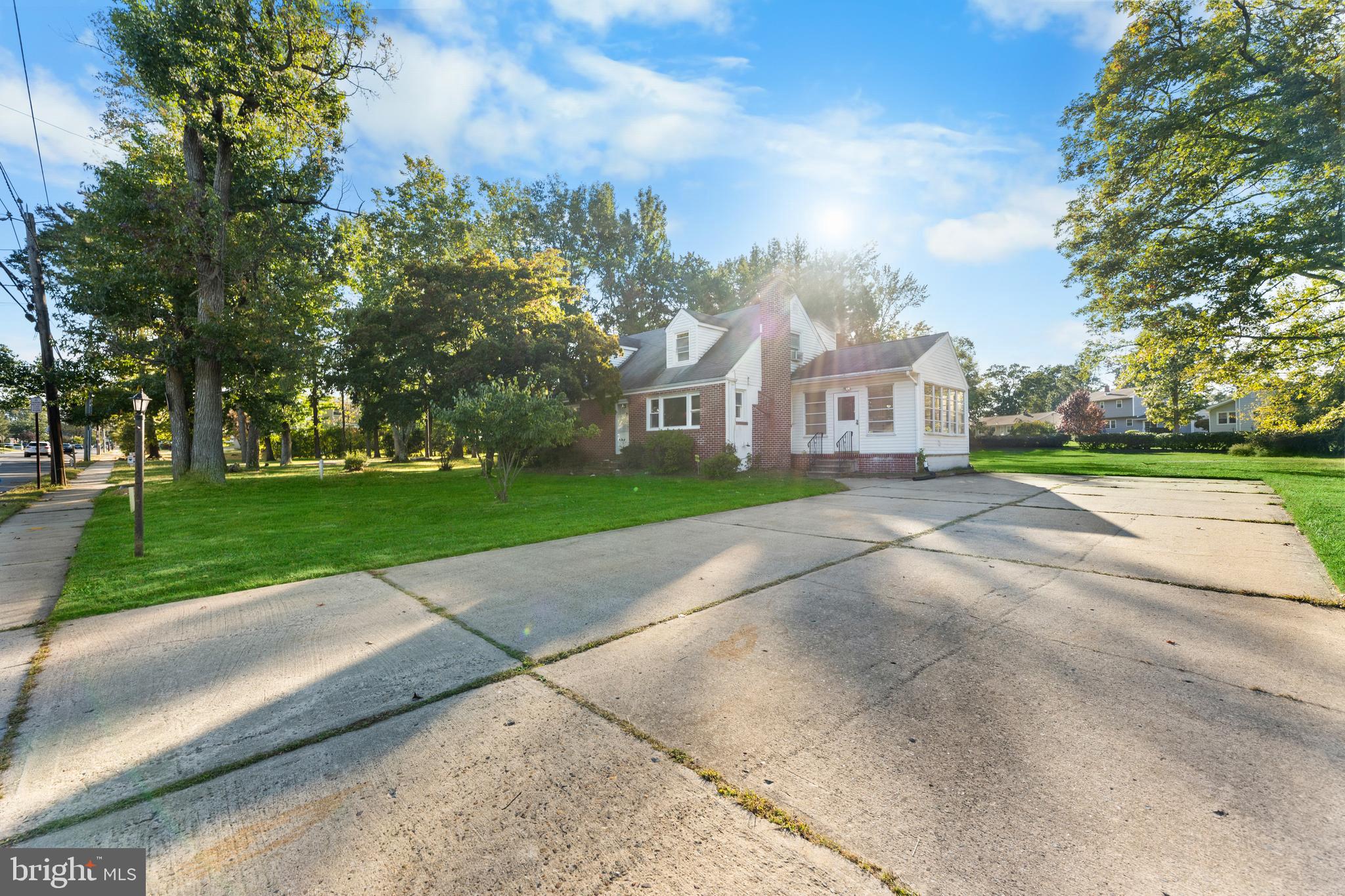 245 Paxson Avenue Hamilton, NJ 08690 - Photo 25 of 26 a view of a house with a yard