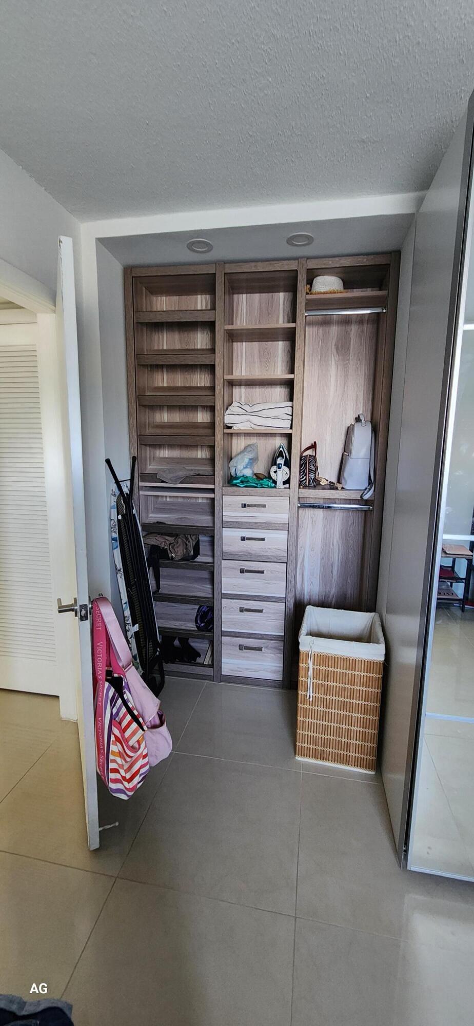 20 Southeast 13th Street, Unit B7 Boca Raton, FL 33432 - Photo 19 of 25 2nd bedroom custom storage built in