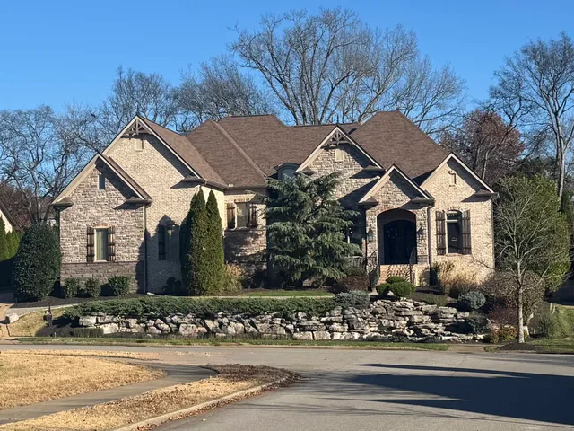 a front view of house with yard