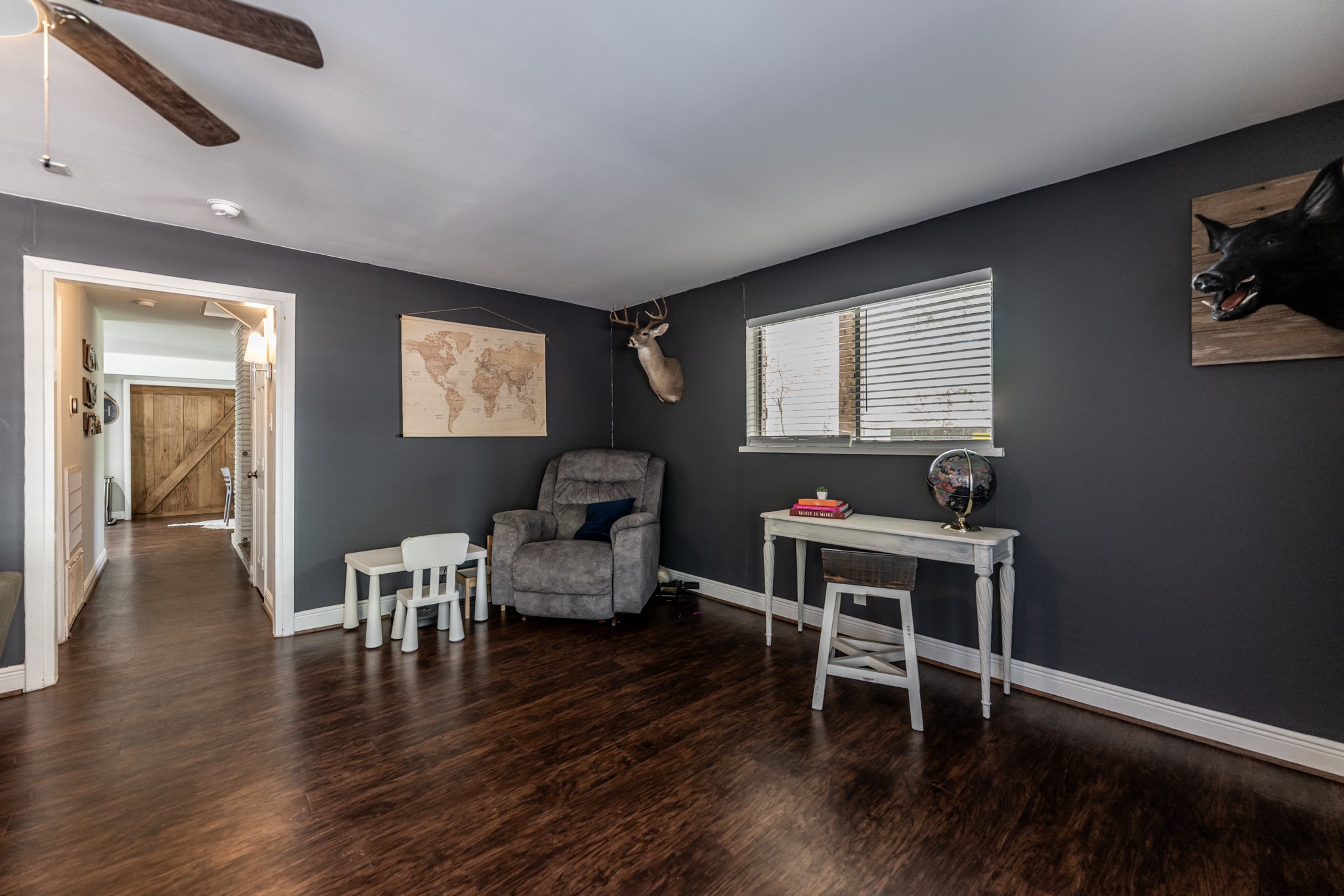 2120 Ave R Huntsville, TX 77340 - Photo 17 of 31 a living room with furniture wooden floor and a window