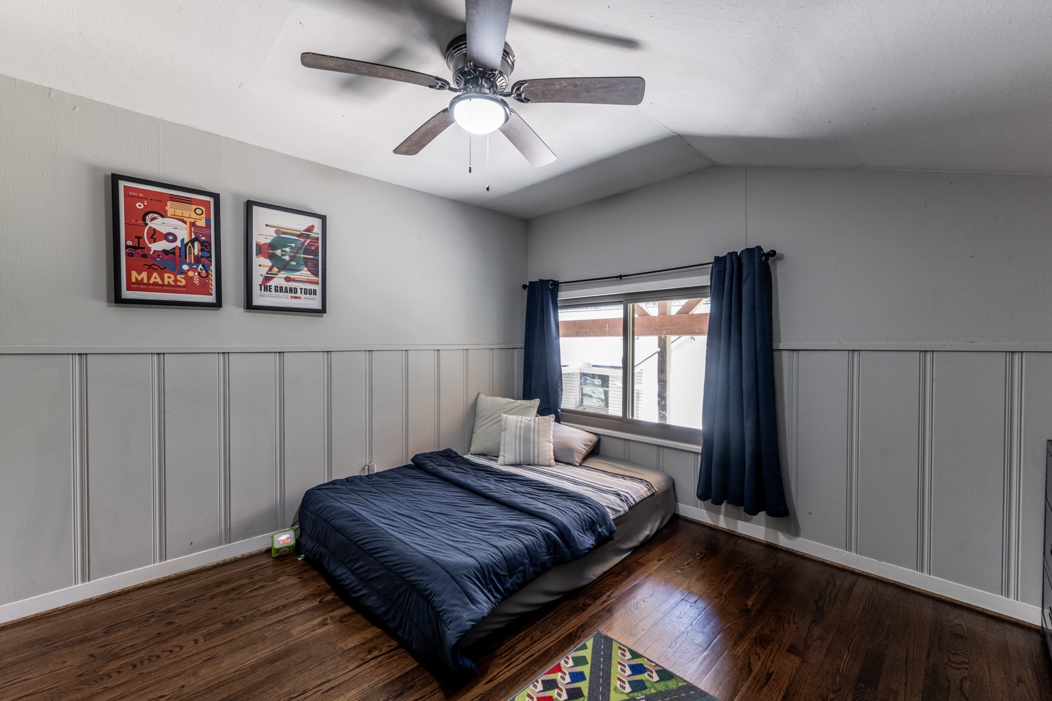 2120 Ave R Huntsville, TX 77340 - Photo 24 of 31 a bedroom with a bed and a window