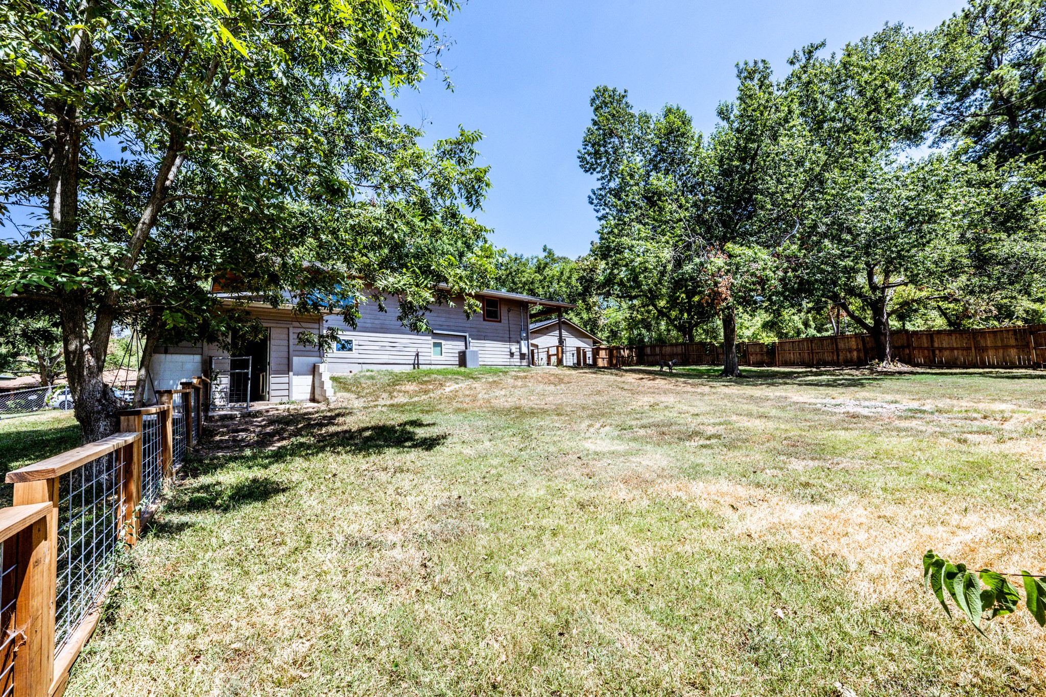 2120 Ave R Huntsville, TX 77340 - Photo 28 of 31 a view of a house with a yard