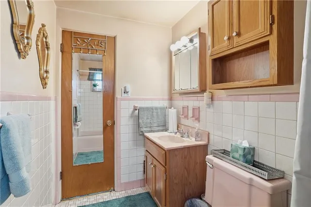 a kitchen with a sink stove and microwave