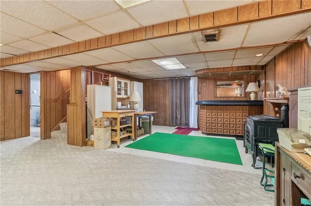 a spacious bathroom with a double vanity sink and a bathtub