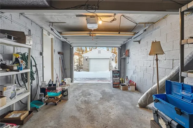 a view of a garage with table and chairs