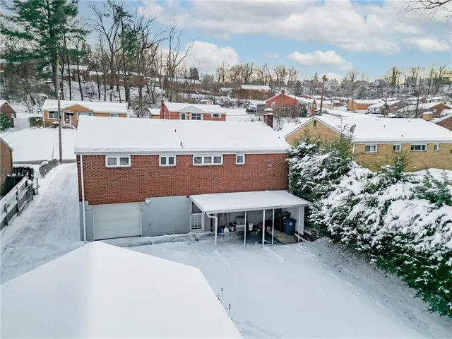 an aerial view of a city with lots of residential buildings