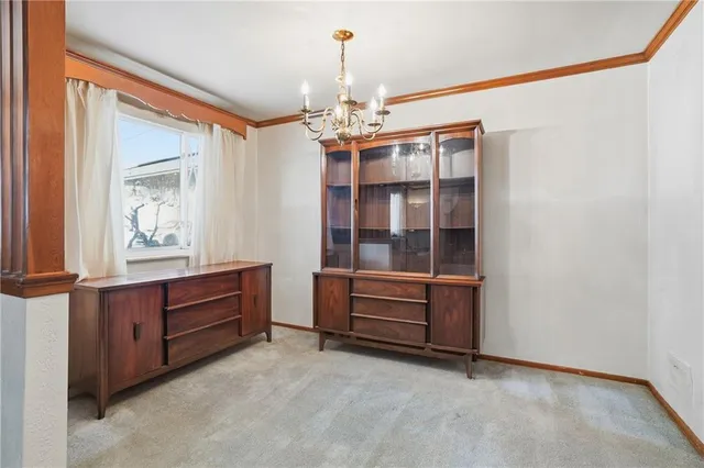 a room with a dresser and a dresser