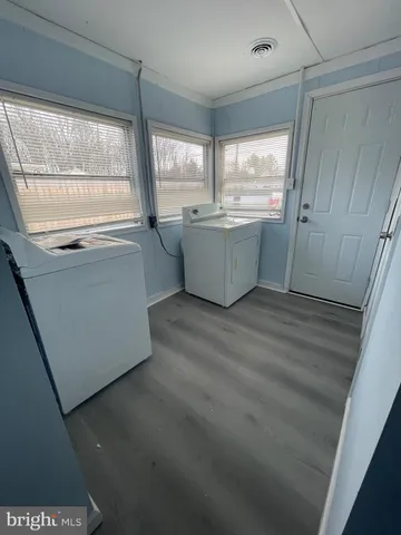 a view of a room with a window