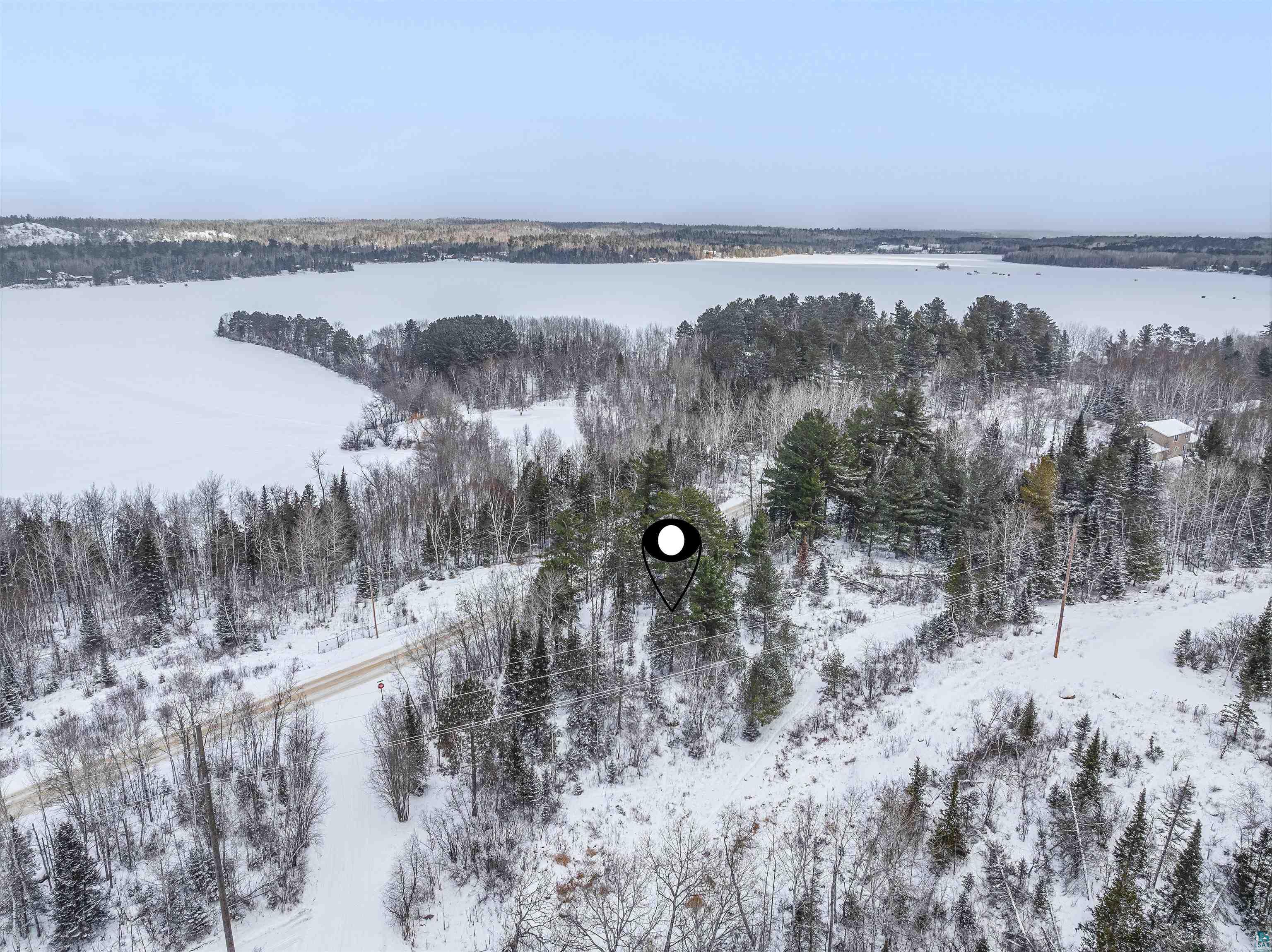 Tbd Trezona Road Ely, MN 55731 - Photo 15 of 22 Snowy aerial view featuring a view of trees