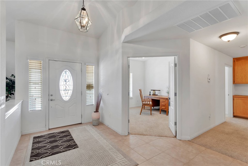 17367 Central Road Apple Valley, CA 92307 - Photo 13 of 61 a view of room with window and hardwood