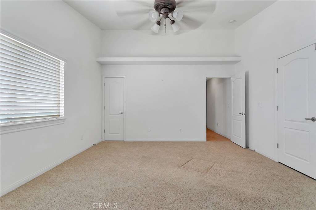 17367 Central Road Apple Valley, CA 92307 - Photo 19 of 61 a view of an empty room with a window