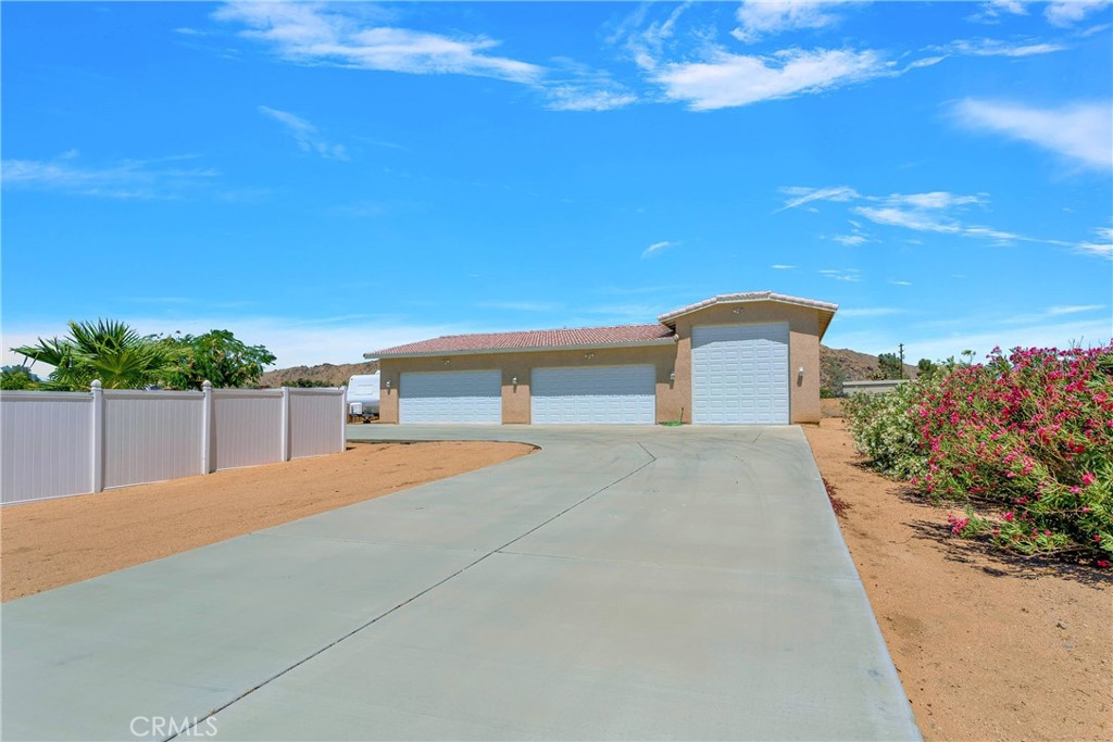 17367 Central Road Apple Valley, CA 92307 - Photo 3 of 61 a house view with a outdoor space