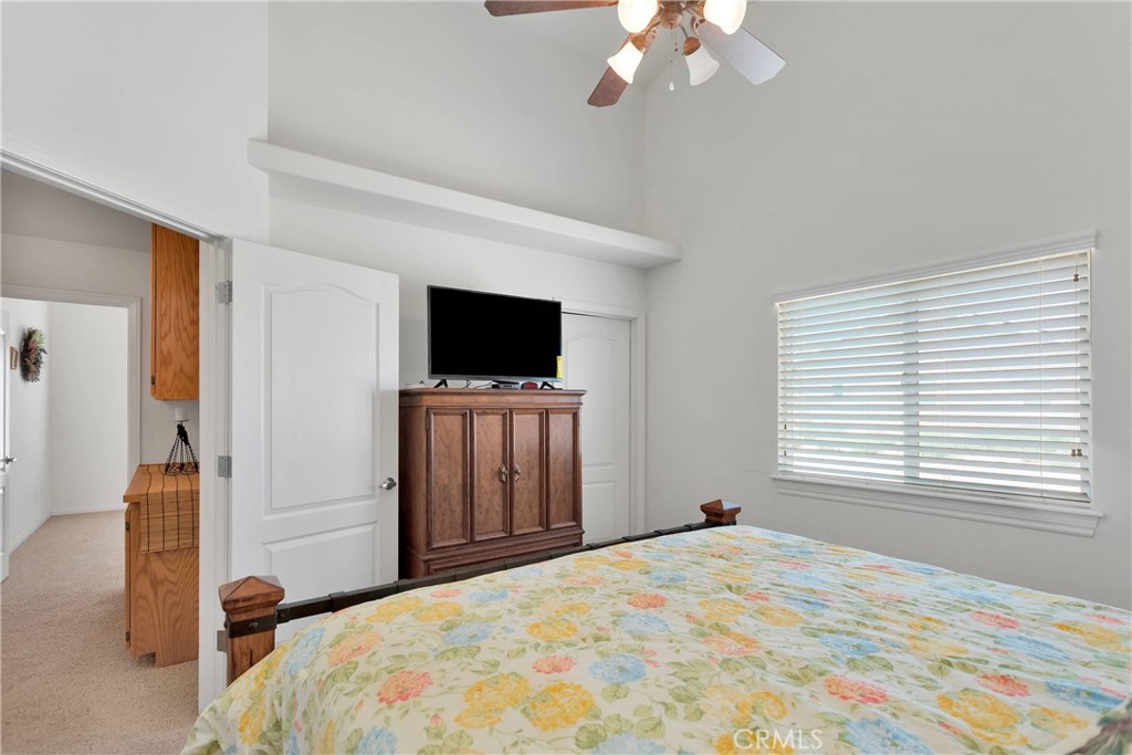 17367 Central Road Apple Valley, CA 92307 - Photo 36 of 61 a bedroom with a bed and a tv