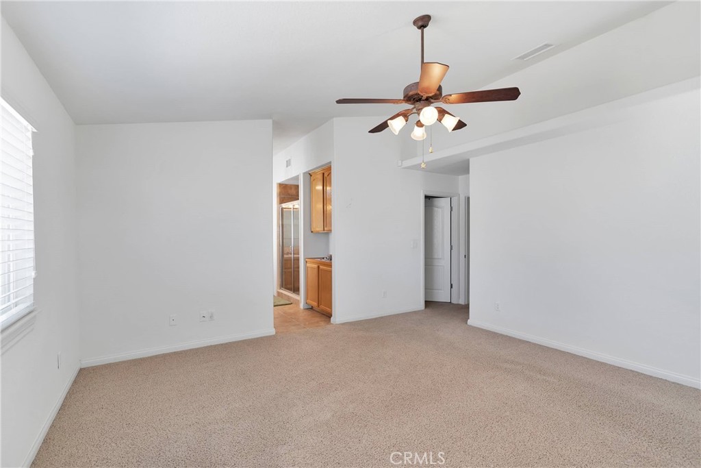 17367 Central Road Apple Valley, CA 92307 - Photo 40 of 61 a view of an empty room with a window