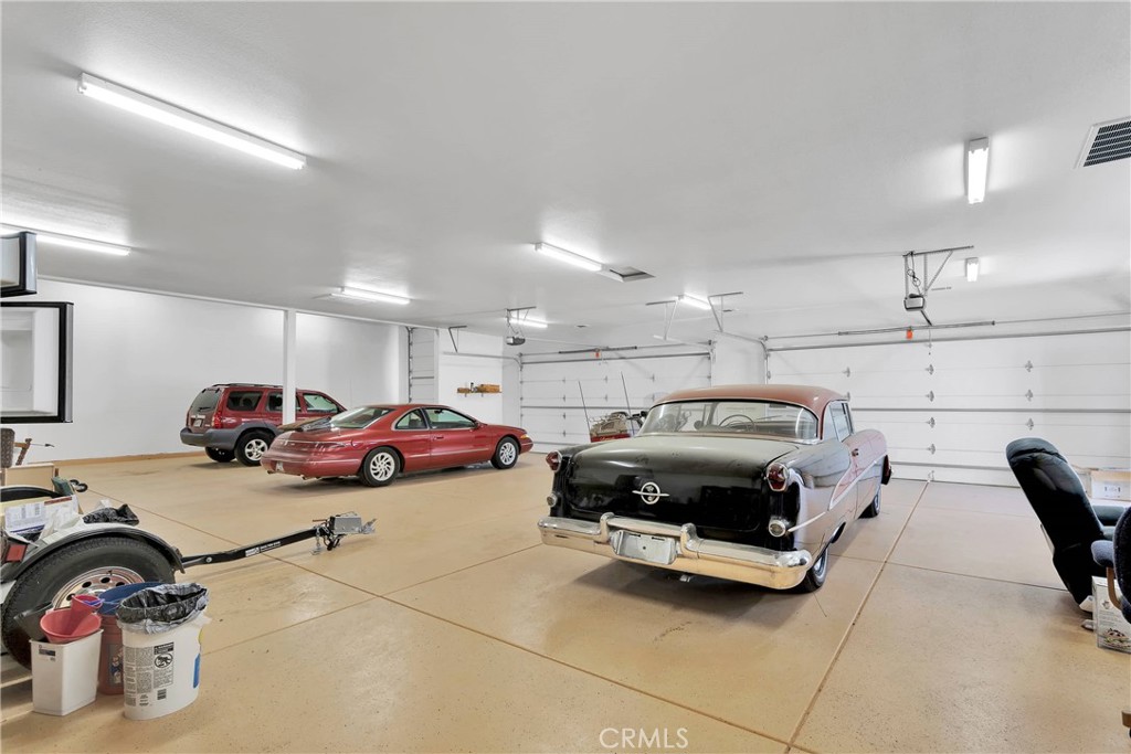 17367 Central Road Apple Valley, CA 92307 - Photo 52 of 61 a car parked in a parking garage