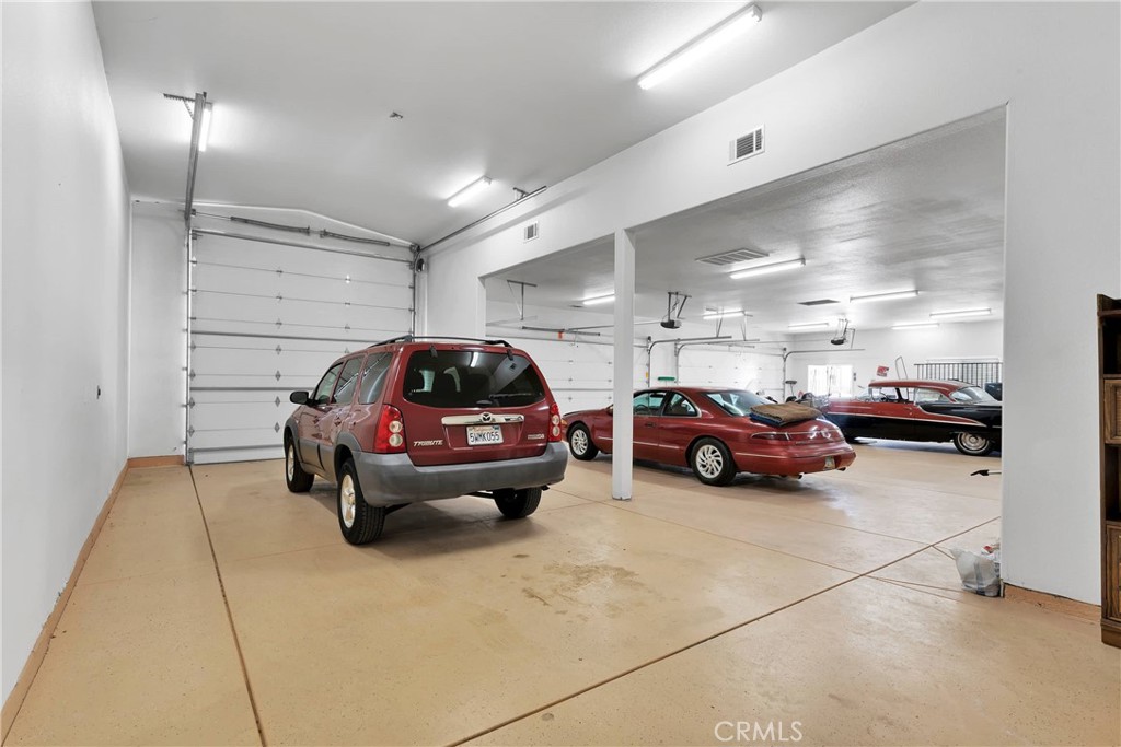 17367 Central Road Apple Valley, CA 92307 - Photo 53 of 61 a car parked in a parking area