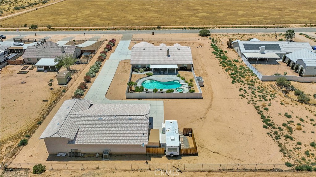 17367 Central Road Apple Valley, CA 92307 - Photo 56 of 61 an aerial view of residential houses with outdoor space