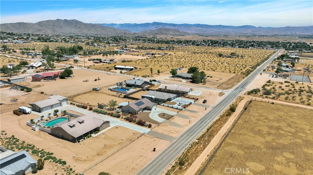 17367 Central Road Apple Valley, CA 92307 - Photo 59 of 61 a picture of a city with a mountain