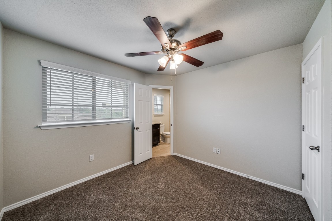 1502 Lucille Street Seguin, TX 78155 - Photo 10 of 13 a view of an empty room with a window