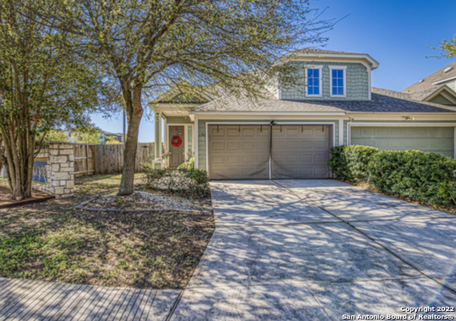 6702 Terra Rye San Antonio, TX 78240 - Photo 1 of 9 a front view of a house with a yard and garage