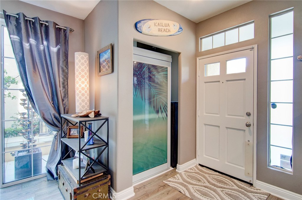 13069 Arborwalk Lane Tustin, CA 92782 - Photo 12 of 47 a view of an entryway with wooden floor