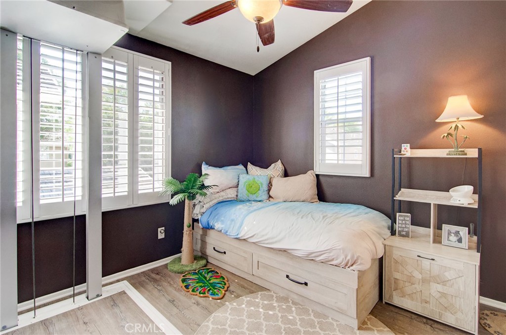 13069 Arborwalk Lane Tustin, CA 92782 - Photo 36 of 47 a bedroom with a bed dresser and a window