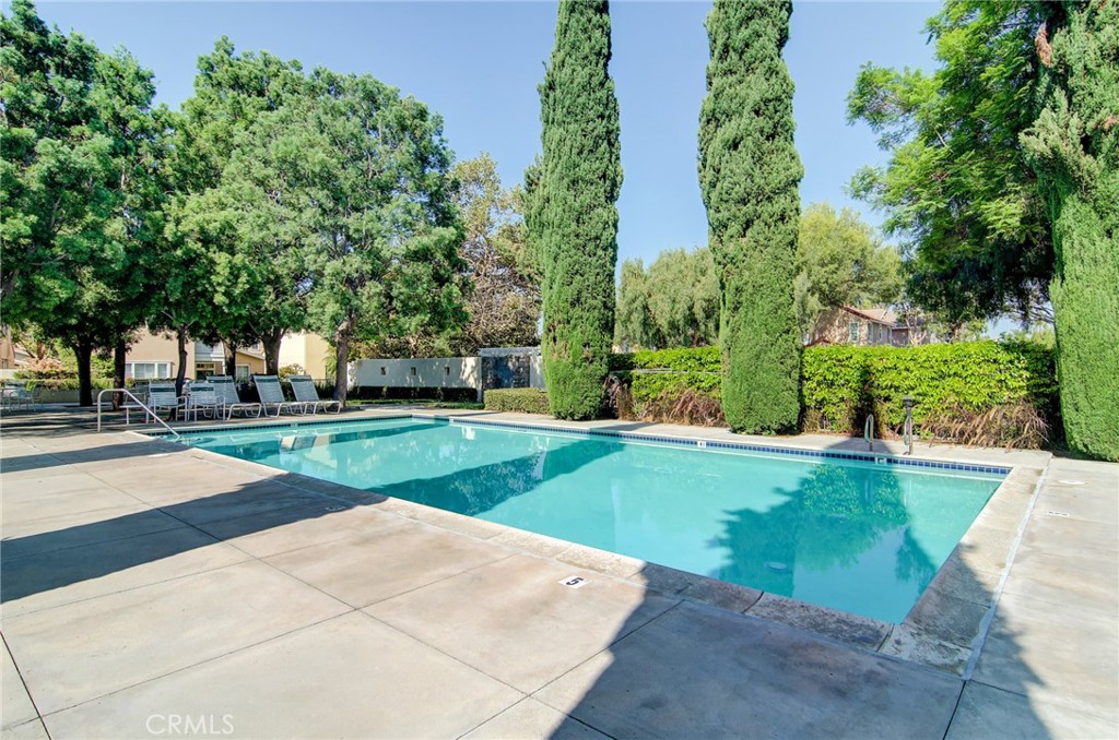 13069 Arborwalk Lane Tustin, CA 92782 - Photo 39 of 47 front view of a house with a yard