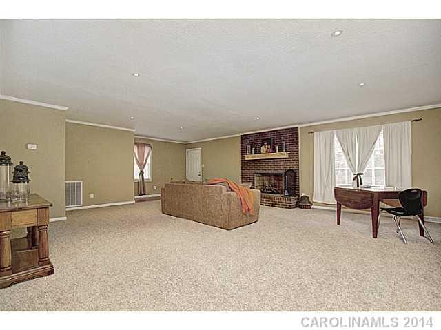 2132 Dunlap Roddey Road Rock Hill, SC 29730 - Photo 2 of 16 a living room with furniture and a fireplace