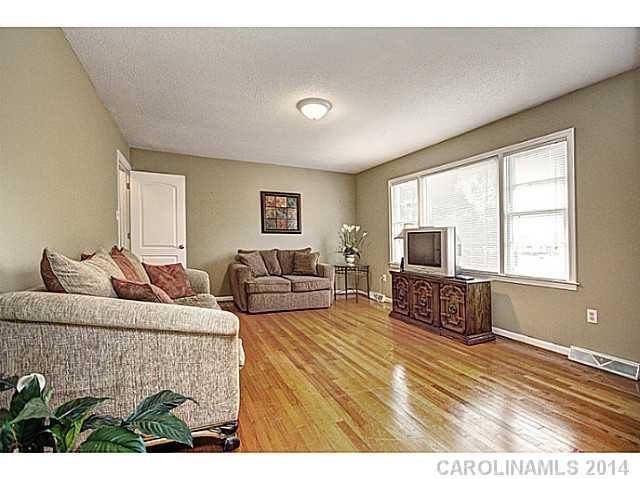 2132 Dunlap Roddey Road Rock Hill, SC 29730 - Photo 3 of 16 a bedroom with furniture and a flat screen tv
