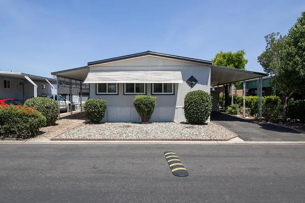 front view of a house with a street