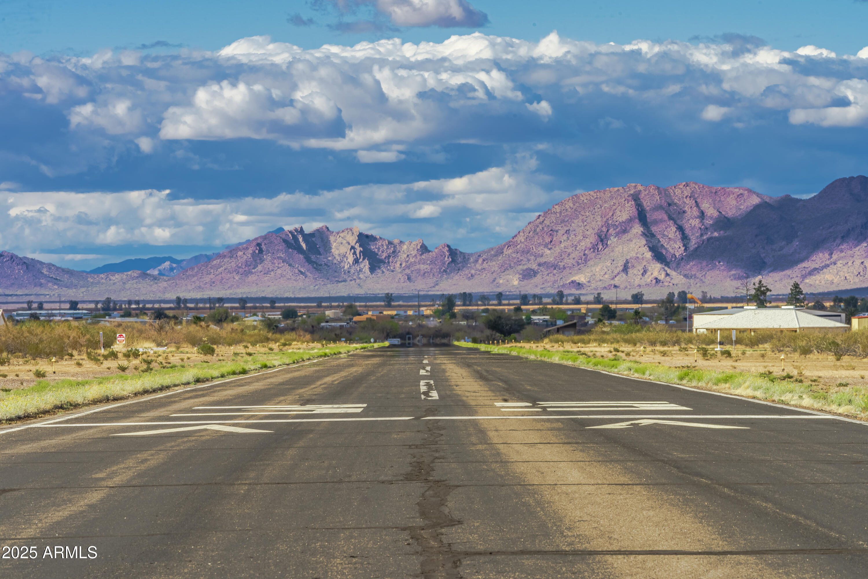 a view of an swimming pool and a yard