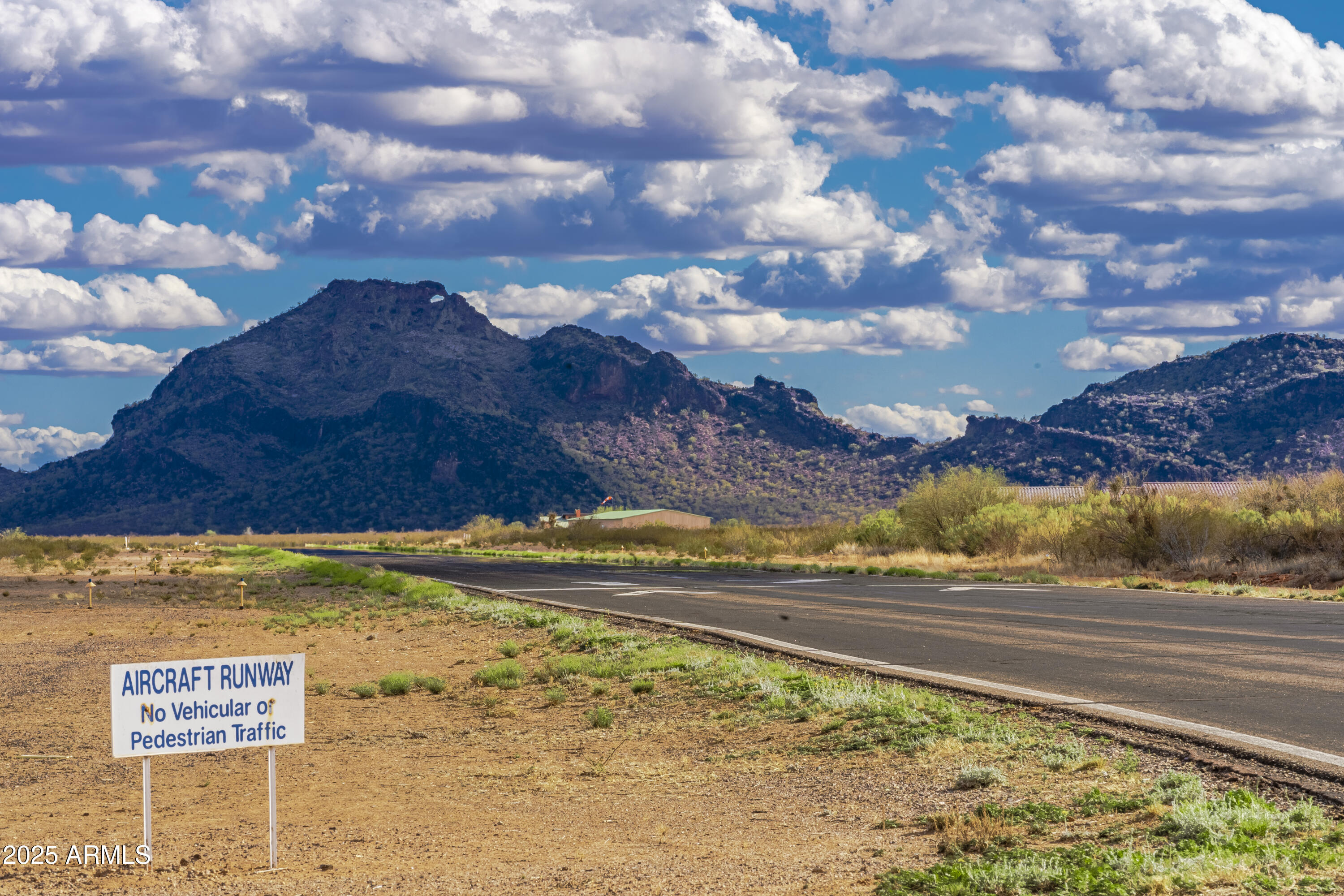50979 West Iver Road Aguila, AZ 85320 - Photo 20 of 21 a view of ocean with a building